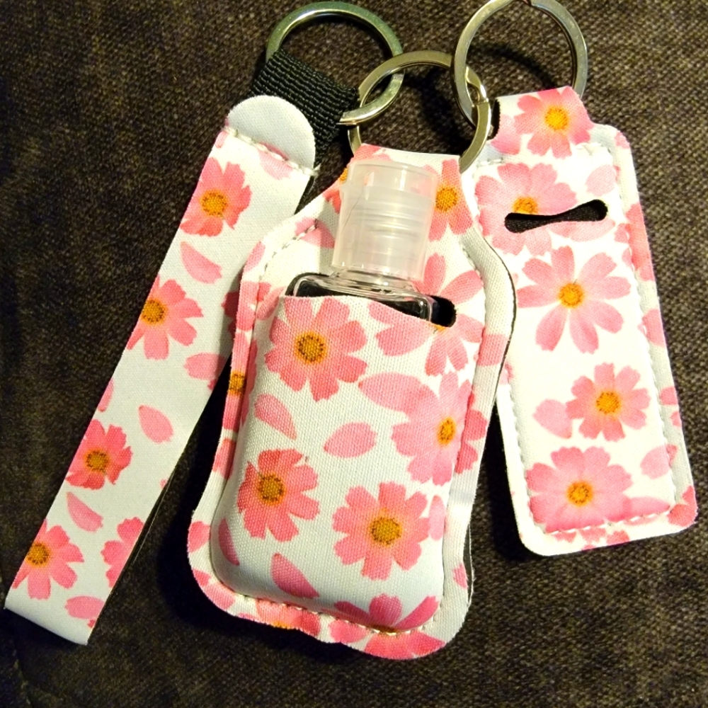 Travel hand sanitizer and chapstick holder